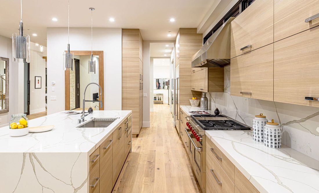 Calacatta Belleza Nuovo Calacatta Belleza Nuovo waterfall island and full-height backsplash